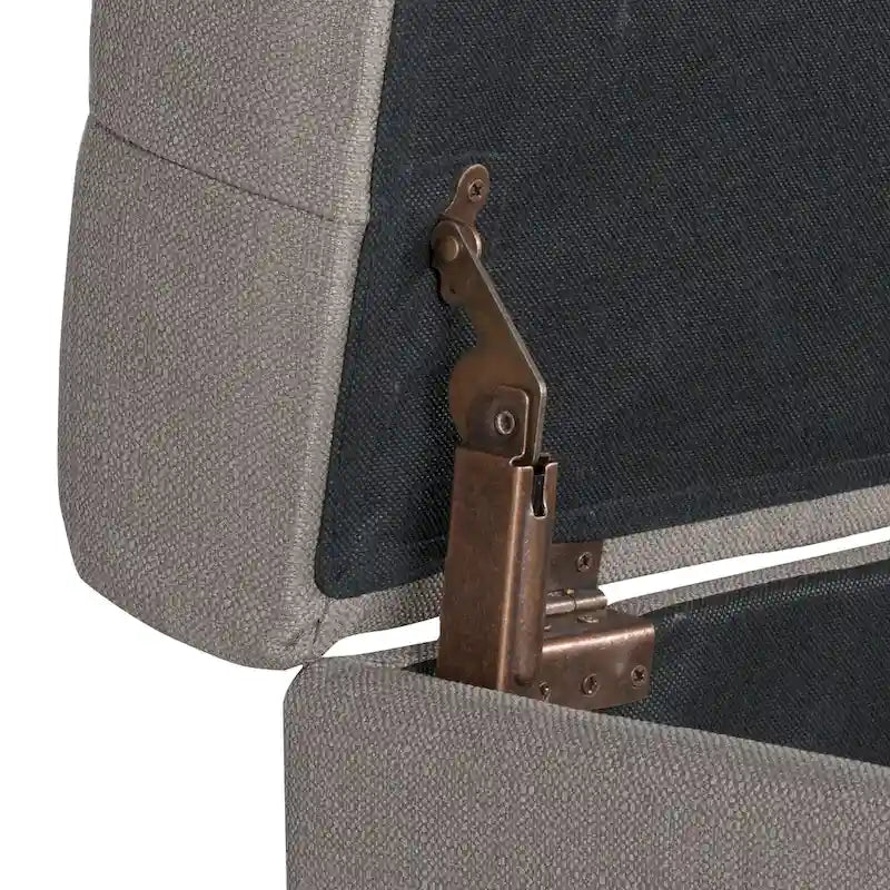Banc de rangement gris capitonné